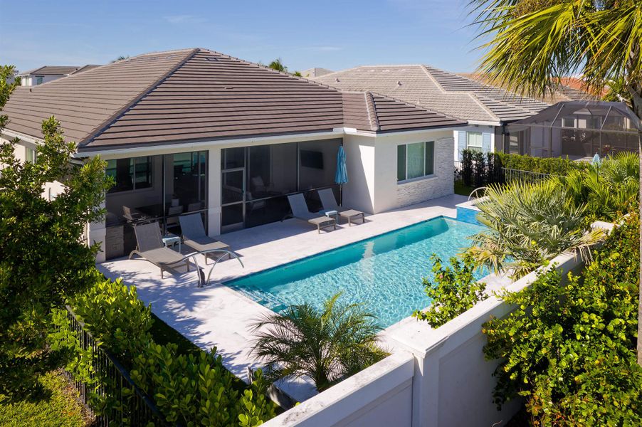 Exterior details and patio area of a home in La Terre at Avenir, Palm Beach Gardens (Image 20). Exterior details and patio area of a home in La Terre at Avenir, Palm Beach Gardens (Image 20).