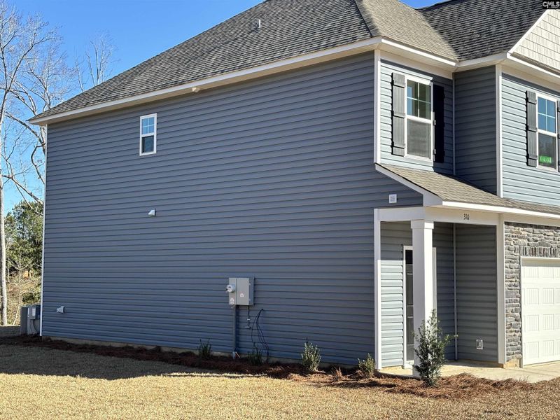 Exterior details and patio area of a home in Rolling Hills, Prosperity (Image 14). Exterior details and patio area of a home in Rolling Hills, Prosperity (Image 14).