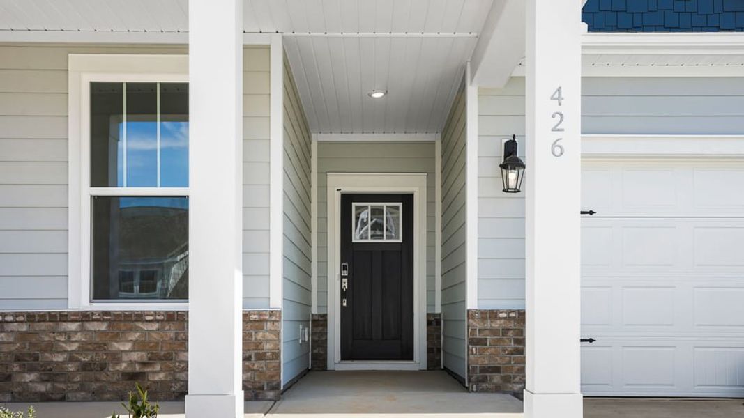 Exterior details and patio area of a home in Williams Ridge, Woodruff (Image 4).