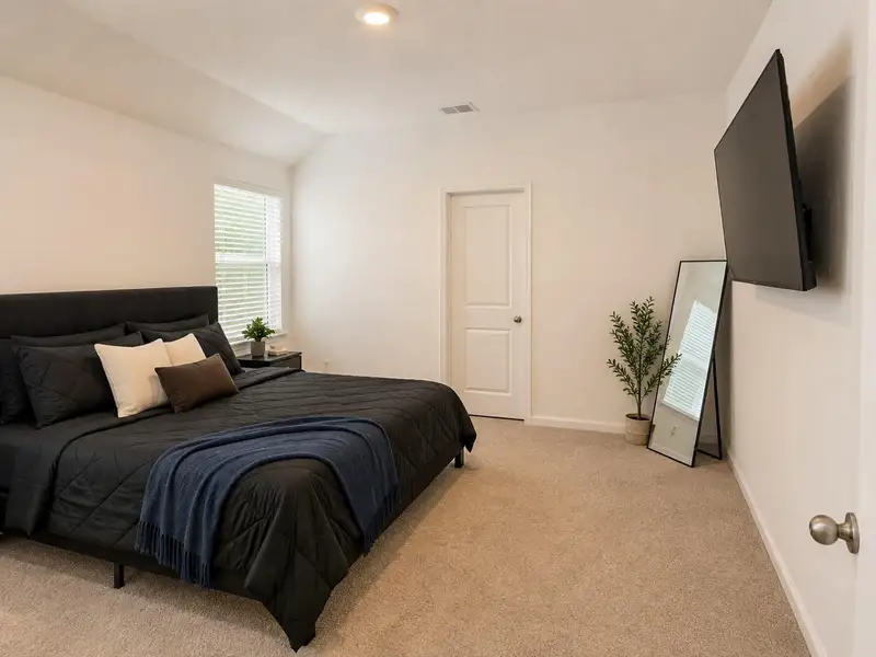 A cozy bedroom with a window offers a peaceful retreat for rest and relaxation. A cozy bedroom with a window offers a peaceful retreat for rest and relaxation.