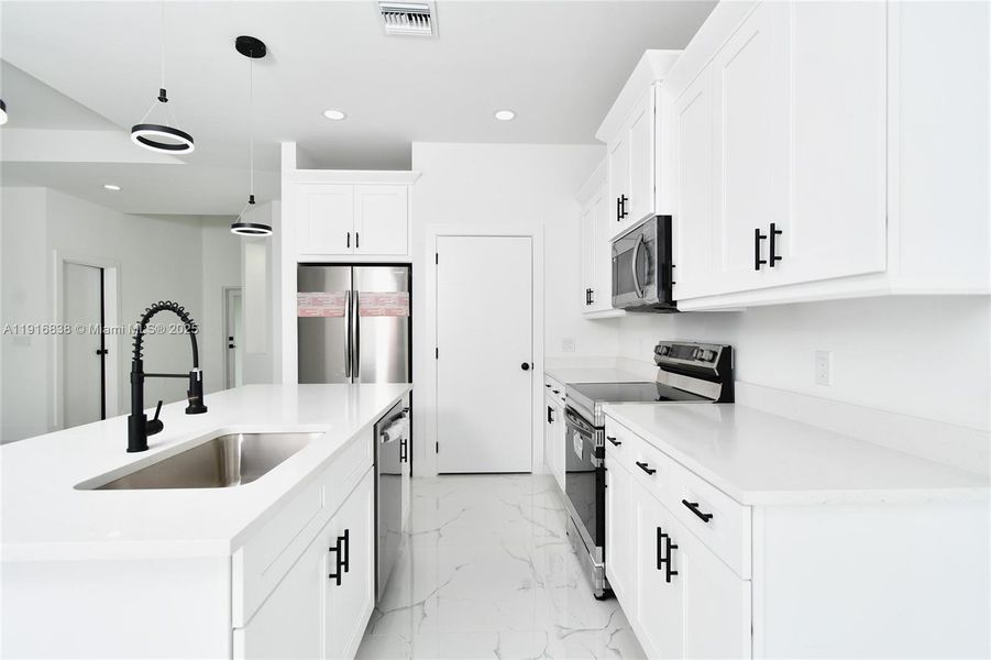 Furnished interior view inside a new home in , Lehigh Acres (Image 5). Furnished interior view inside a new home in , Lehigh Acres (Image 5).