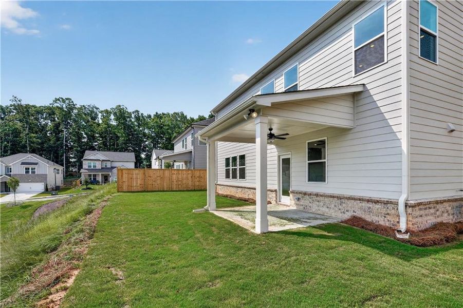 Exterior details and patio area of a home in Bailey Fence, Dacula (Image 24). Exterior details and patio area of a home in Bailey Fence, Dacula (Image 24).