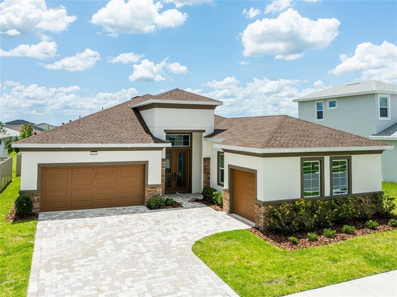Front exterior of a new home in , Wesley Chapel, FL, highlighting curb appeal (Image 2).