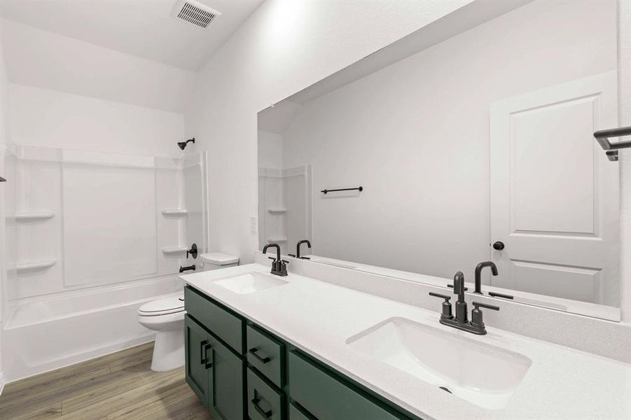 Furnished interior view inside a new home in Creekview Fossil Ridge, Pilot Point (Image 13).