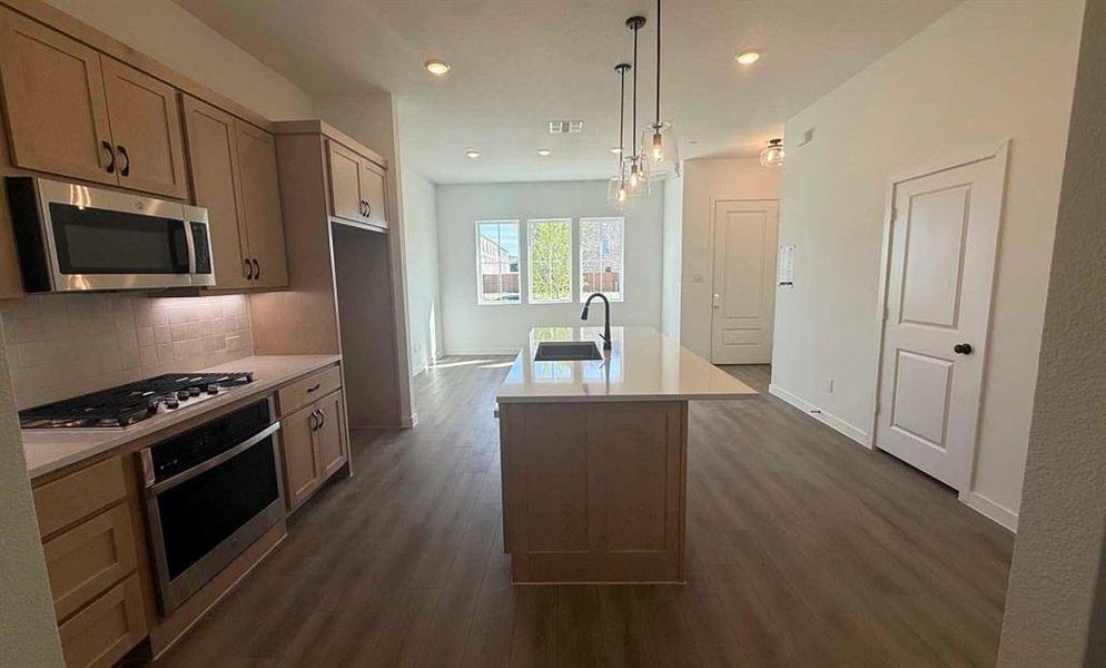 Furnished interior view inside a new home in Collin Creek, Plano (Image 6).