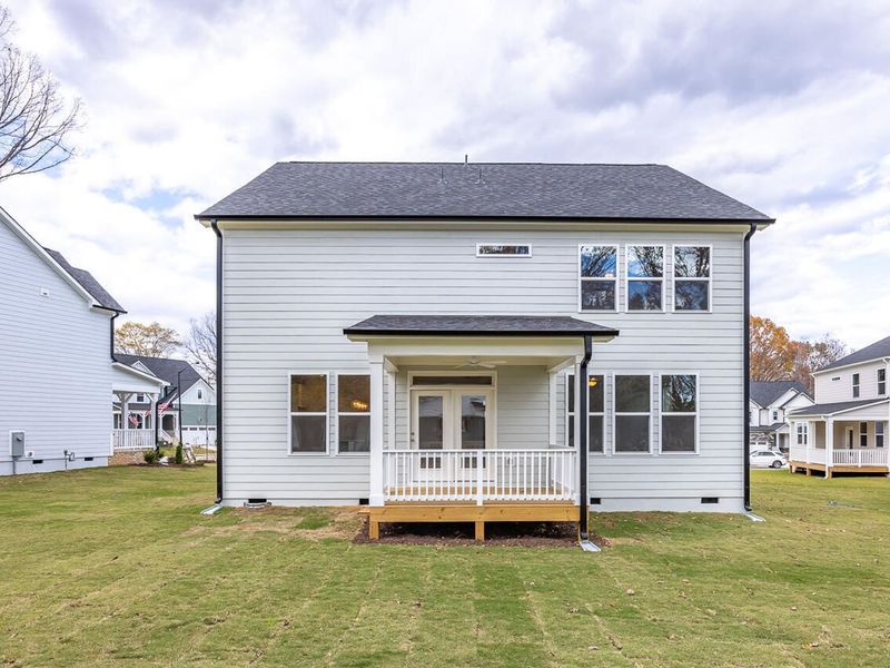 Exterior details and patio area of a home in Retreat at North Main, Lillington (Image 2).