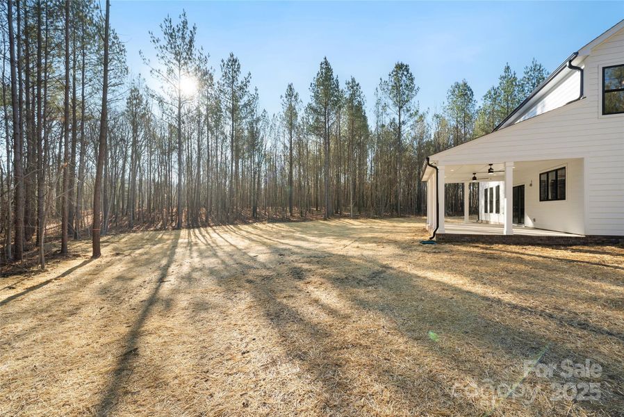 Exterior details and patio area of a home in , Wingate (Image 24).