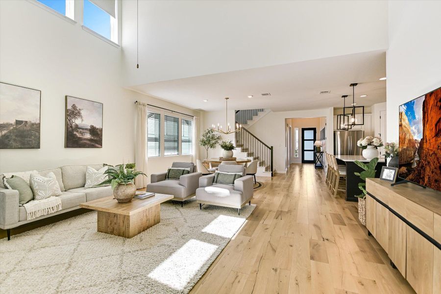 The open floorplan with high ceilings is perfect for entertaining family and friends...plenty of room for everyone to spread out and be comfortable.