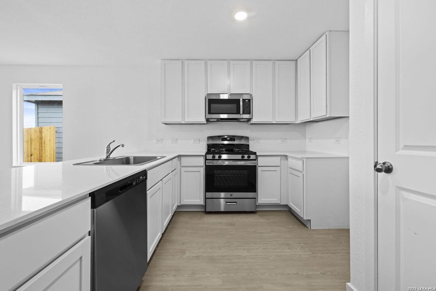 Furnished interior view inside a new home in Spring Grove, St. Hedwig (Image 7).