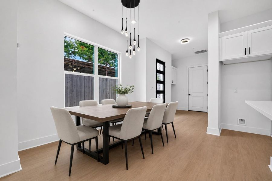 Dining room has been virtually staged to show furniture scaling and layout possibilities Dining room has been virtually staged to show furniture scaling and layout possibilities