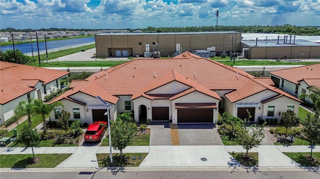 Front exterior of a new home in Southshore Bay Active Adult, Wimauma, FL, highlighting curb appeal (Image 29).