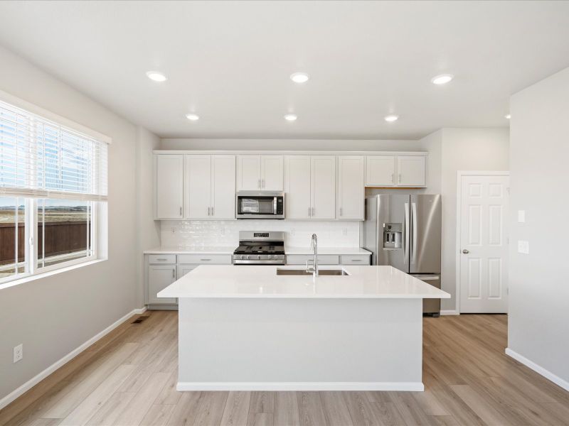 Furnished interior view inside a new home in Buffalo Highlands: The Flora Collection, Commerce City (Image 3).