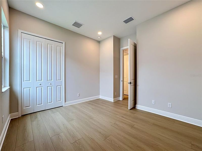 Spacious, unfurnished interior of a new home in River Preserve Estates, Parrish (Image 32).