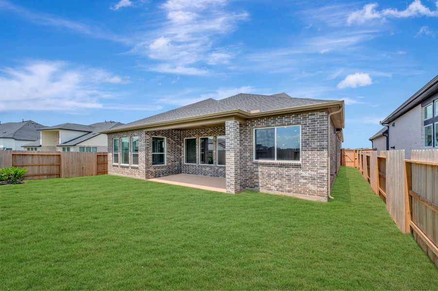 Exterior details and patio area of a home in Brookewater - Ascent Collection, Rosenberg (Image 3).