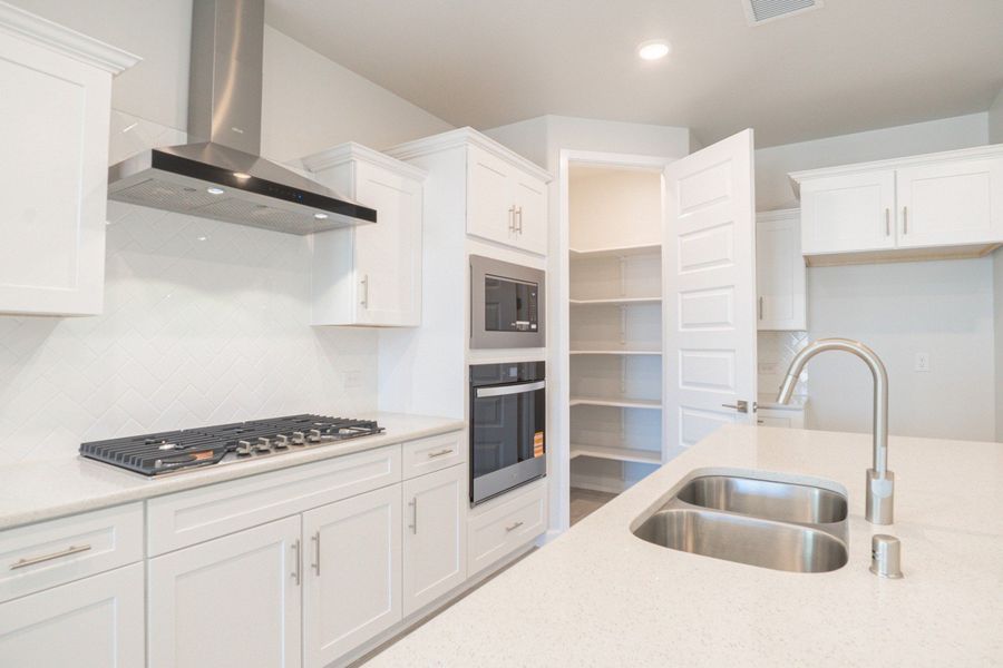 Furnished interior view inside a new home in Paseo Del Este, El Paso (Image 5).