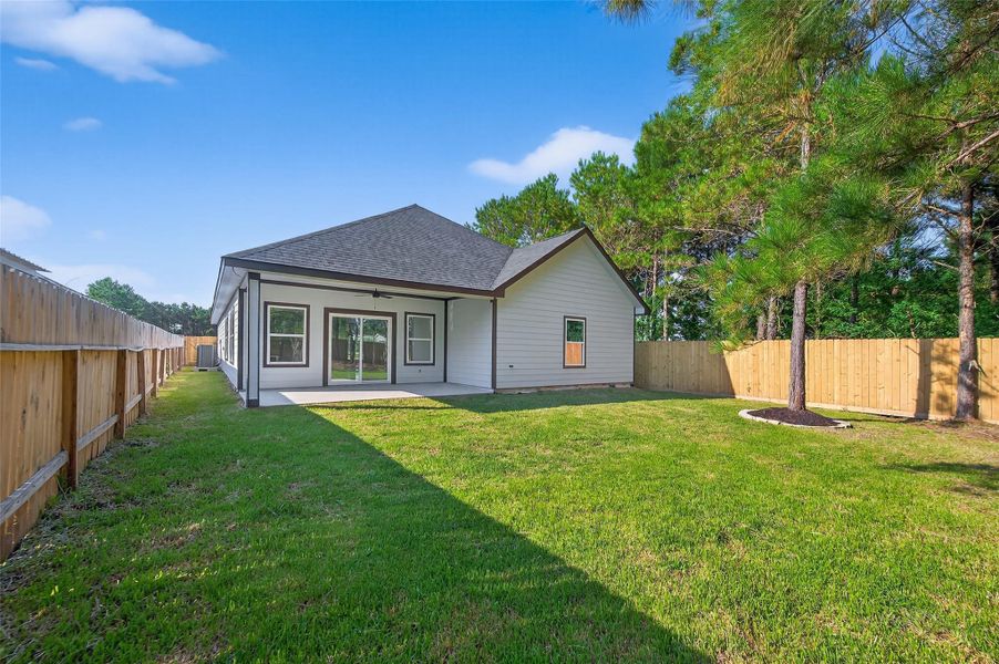 Front exterior of a new home in , Cleveland, TX, highlighting curb appeal (Image 21).