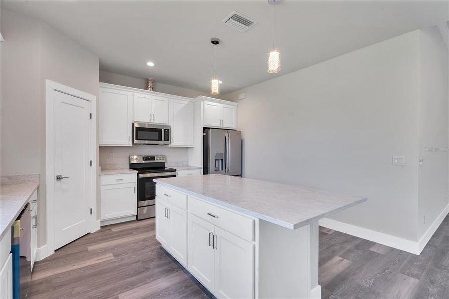 Furnished interior view inside a new home in , Port Charlotte (Image 3).