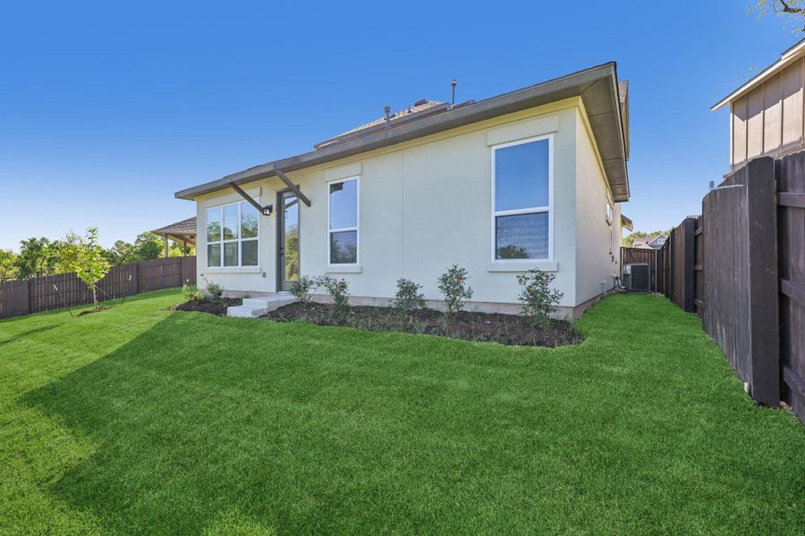 Exterior details and patio area of a home in Cross Creek, Cedar Park (Image 23).