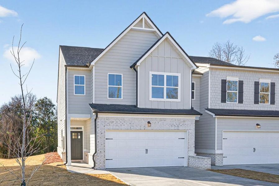 Front exterior of a new home in , Commerce, GA, highlighting curb appeal (Image 2). Front exterior of a new home in , Commerce, GA, highlighting curb appeal (Image 2).