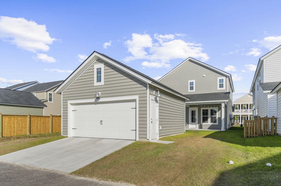 Front exterior of a new home in Heron's Walk at Summers Corner, Summerville, SC, highlighting curb appeal (Image 25).