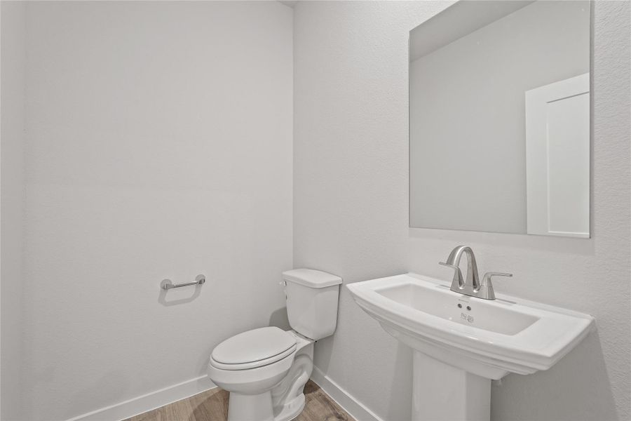 Furnished interior view inside a new home in Sunterra, Katy (Image 8).