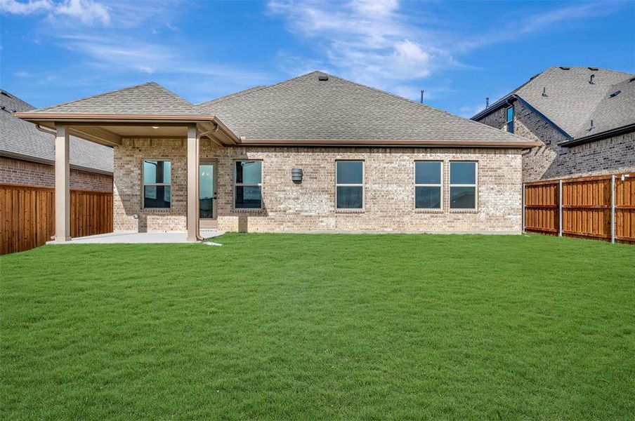 Exterior details and patio area of a home in Aspire at Reunion, Newark (Image 3). Exterior details and patio area of a home in Aspire at Reunion, Newark (Image 3).