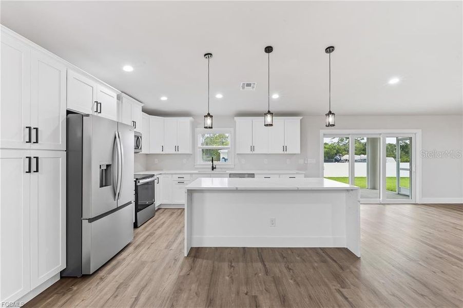 Furnished interior view inside a new home in , Punta Gorda (Image 6).