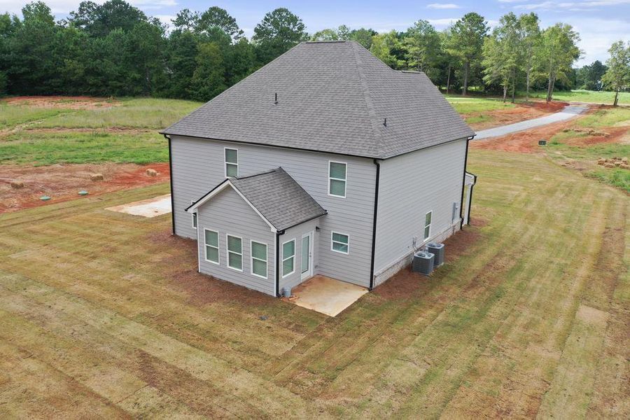 Front exterior of a new home in , McDonough, GA, highlighting curb appeal (Image 1).