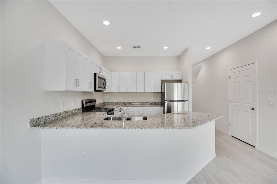 Furnished interior view inside a new home in , Kissimmee (Image 13).