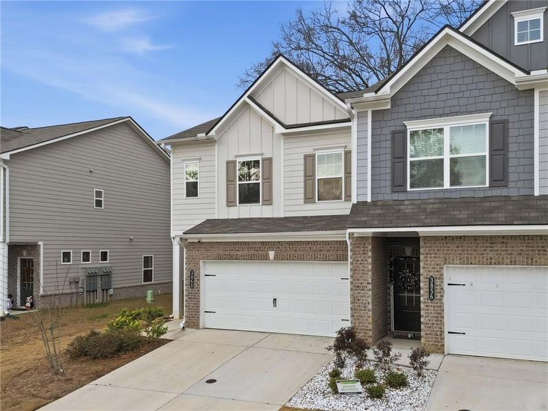Front exterior of a new home in , Powder Springs, GA, highlighting curb appeal (Image 23).