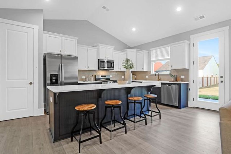 Representative furnished interior of a home built from the Milo P by True Homes in Homecoming, Ravenel (Image 2).