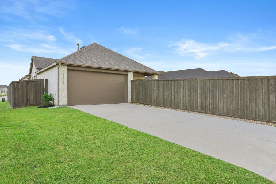 Exterior details and patio area of a home in Riceland: 42ft. lots, Mont Belvieu (Image 23).