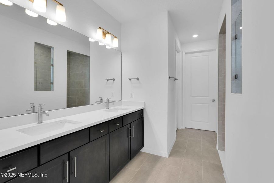 Furnished interior view inside a new home in Summer Bay at Grand Oaks, St. Augustine (Image 12).