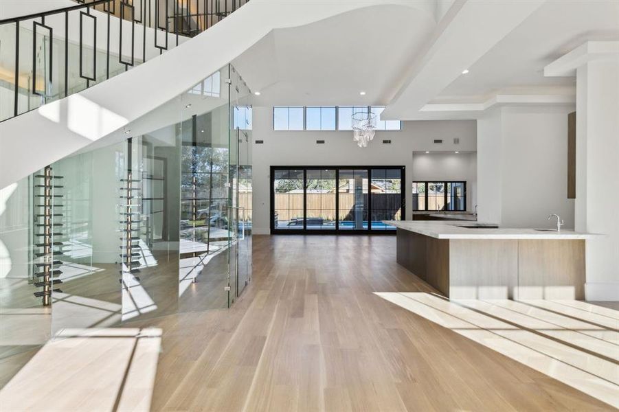 Lobby with recessed lighting and a towering ceiling