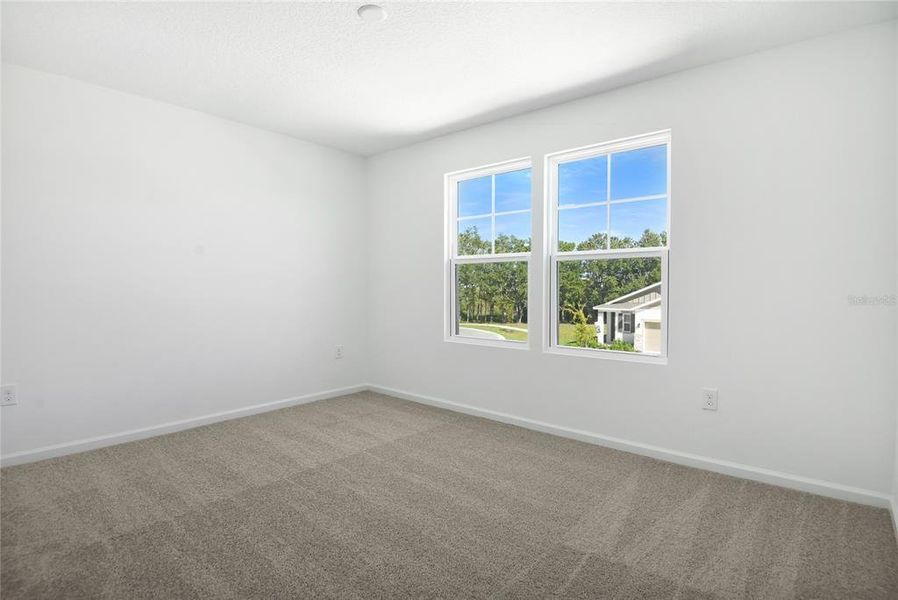 Spacious, unfurnished interior of a new home in Seasons at Shores of Lake Dell, Dundee (Image 13).