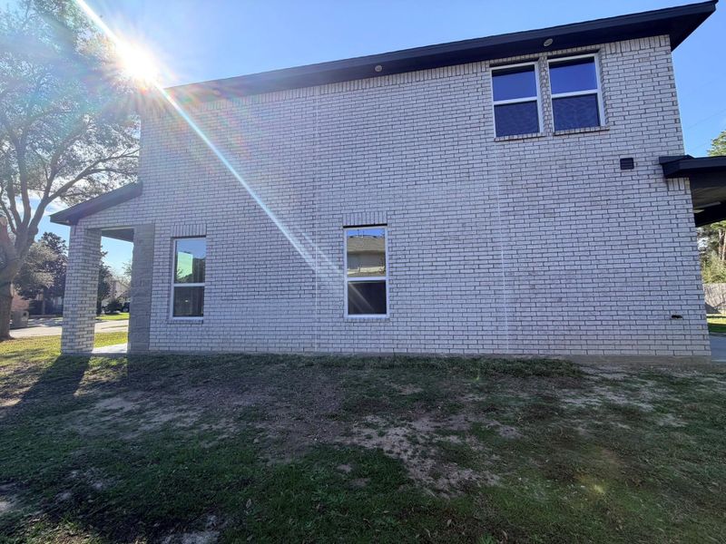 Exterior details and patio area of a home in , Houston (Image 4).