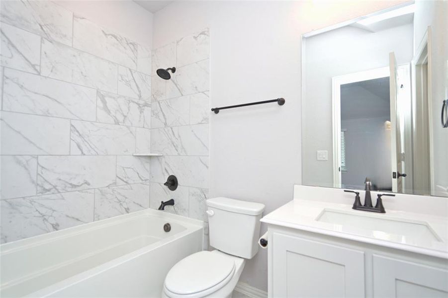 Furnished interior view inside a new home in Coyote Crossing, Godley (Image 14).
