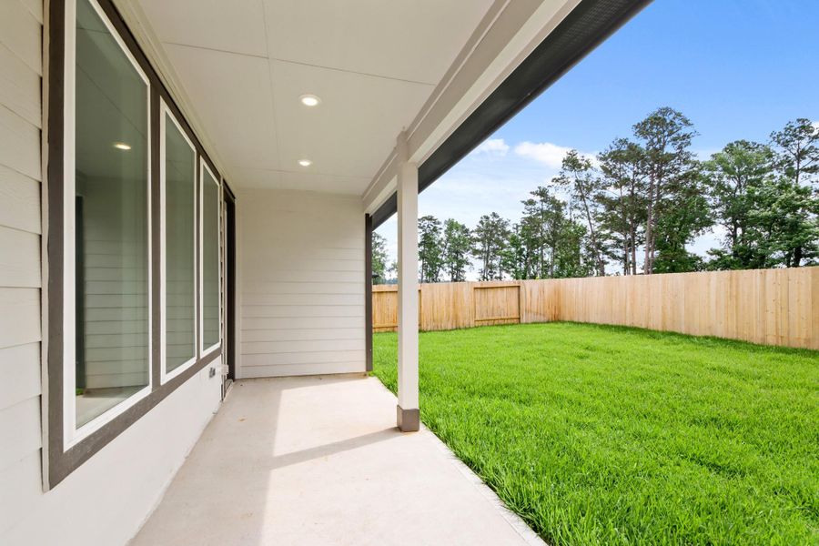 Exterior details and patio area of a home in Mill Creek Estates, Magnolia (Image 4).