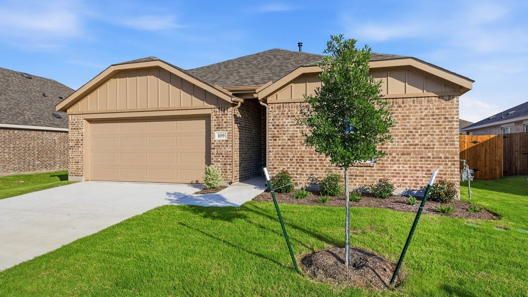 Front exterior of a new home in Patriot Estates, Venus, TX, highlighting curb appeal (Image 2). Front exterior of a new home in Patriot Estates, Venus, TX, highlighting curb appeal (Image 2).