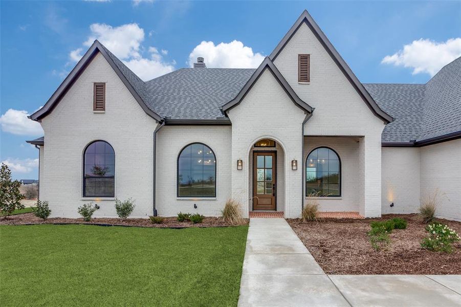 Front exterior of a new home in , Aledo, TX, highlighting curb appeal (Image 2).