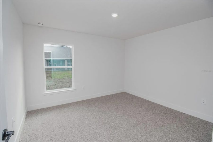Spacious, unfurnished interior of a new home in Hickory Ridge Estates, Lake Wales (Image 28).