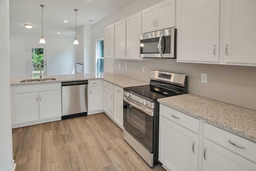 Furnished interior view inside a new home in Marlin Pointe, White House (Image 4).