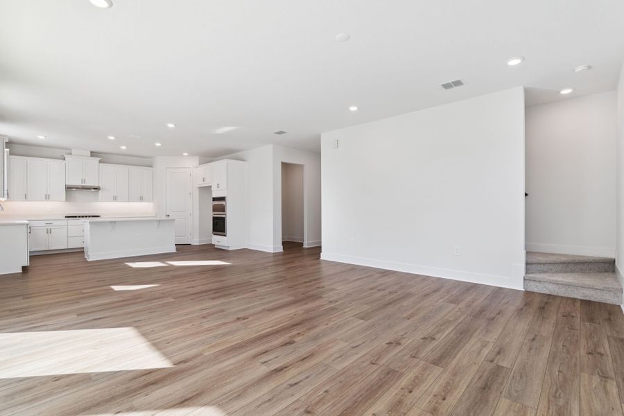 Representative unfurnished interior of a home built from the Clementine by Hartizen Homes in Eden Crest, Apopka (Image 14).