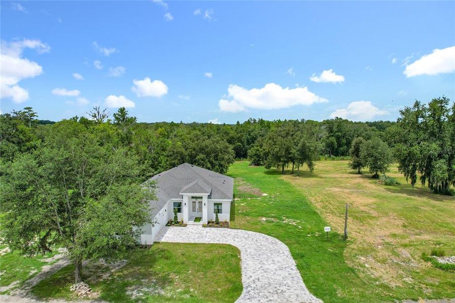Front exterior of a new home in , Plant City, FL, highlighting curb appeal (Image 1).