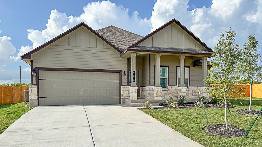 Front exterior of a new home in Creekfall, Burnet, TX, highlighting curb appeal (Image 2). Front exterior of a new home in Creekfall, Burnet, TX, highlighting curb appeal (Image 2).