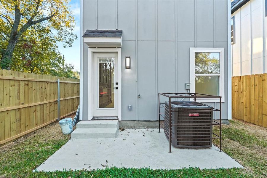 Property entrance featuring board and batten siding Property entrance featuring board and batten siding