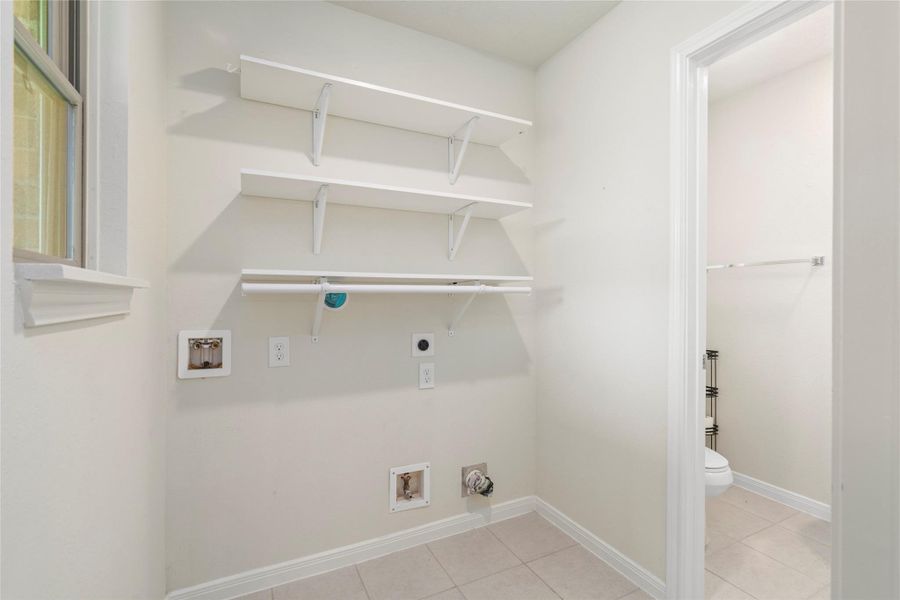 The light and bright utility room. The light and bright utility room.