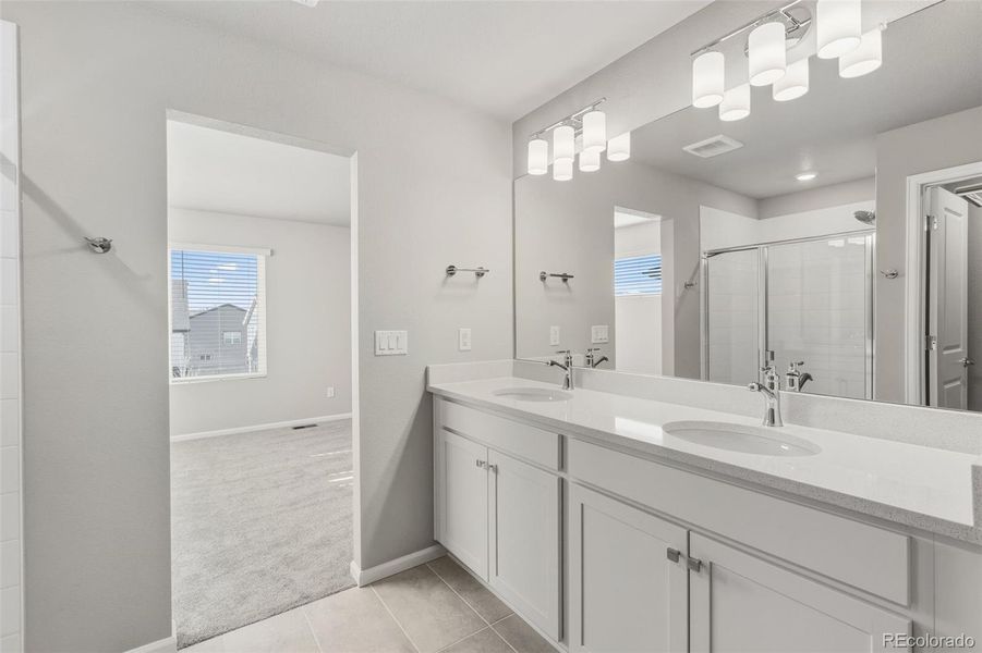 Furnished interior view inside a new home in Woodrose at Painted Prairie, Aurora (Image 8).