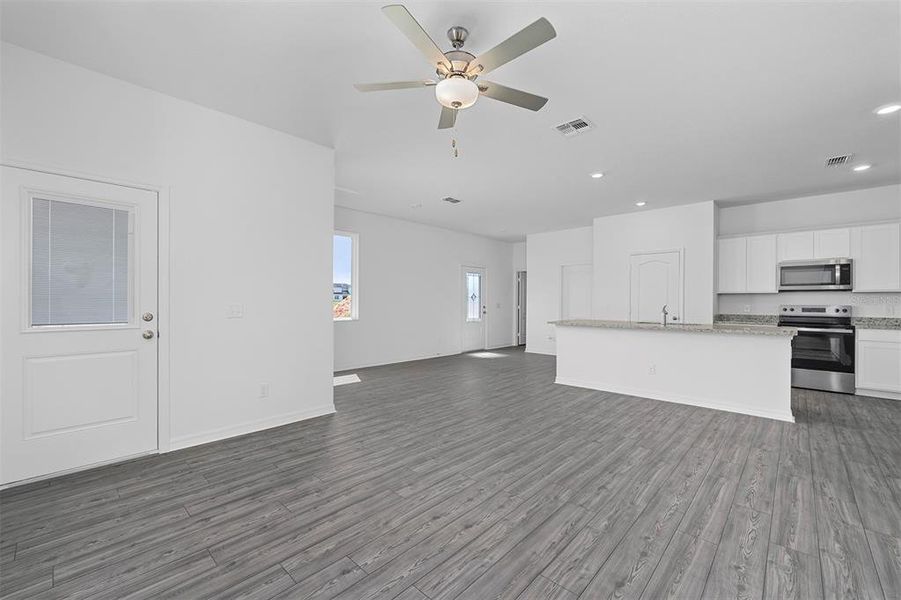 Spacious, unfurnished interior of a new home in Noah Estates at Tuscany Preserve, Poinciana (Image 11). Spacious, unfurnished interior of a new home in Noah Estates at Tuscany Preserve, Poinciana (Image 11).