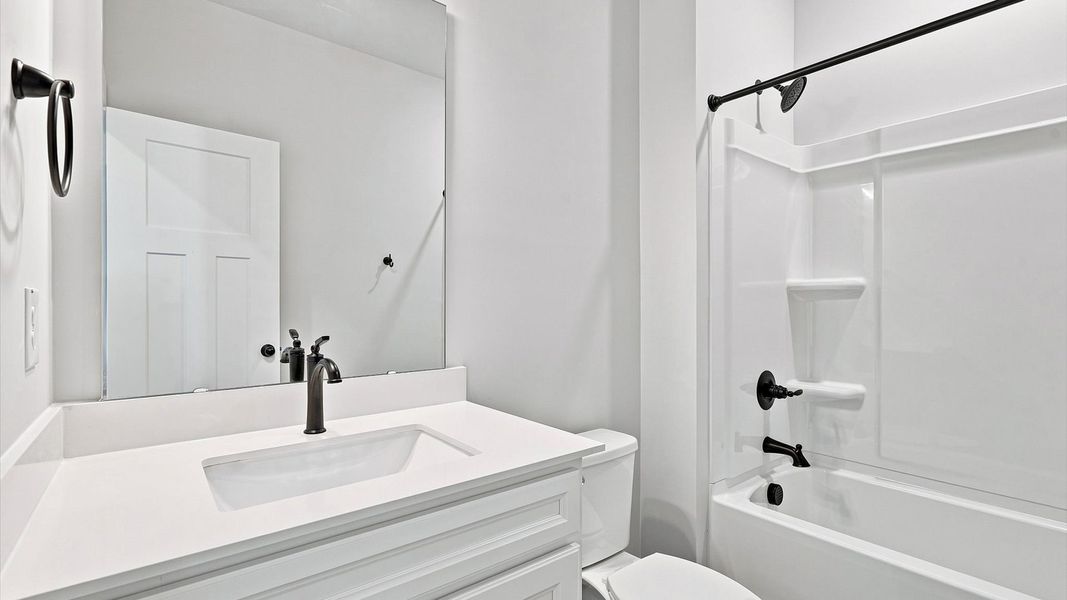 Accomplished full bath designed with both comfort and sophistication in mind Accomplished full bath designed with both comfort and sophistication in mind